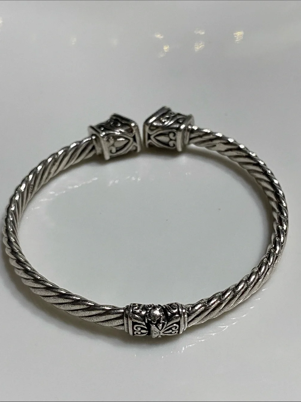 Stainless Steel Twisted Cuff Bracelet with Gold Accents